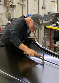Employee at Moses AutoMall Huntington Working in the Body Shop
